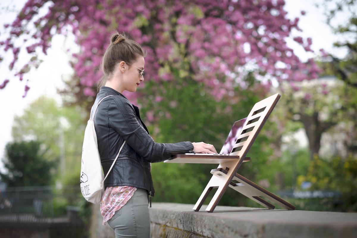 Female using cloud technology on a mobile workstation