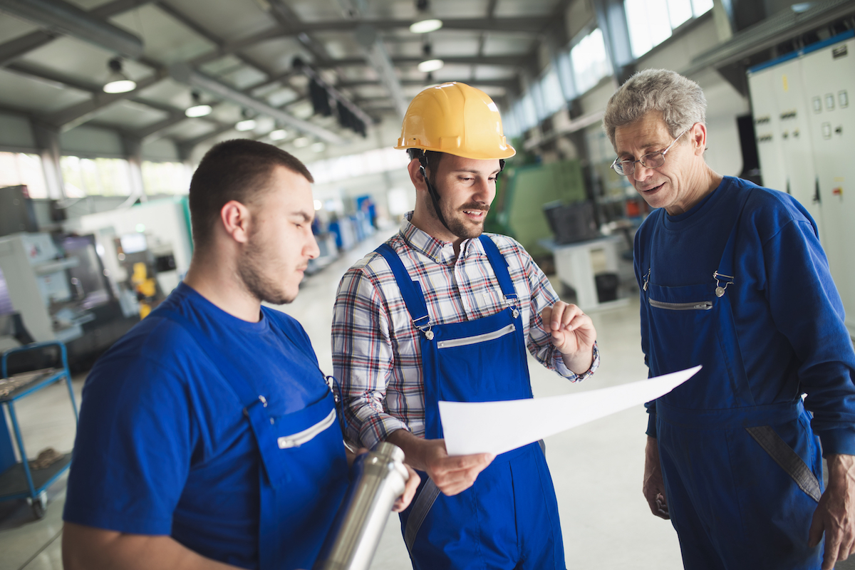 Supplier Relationship Management Supplier Relationship Management Supplier with engineer checking on production in factory