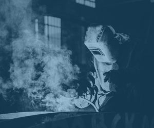 Epicor ERP factory worker welding depicting streamlined productivity.